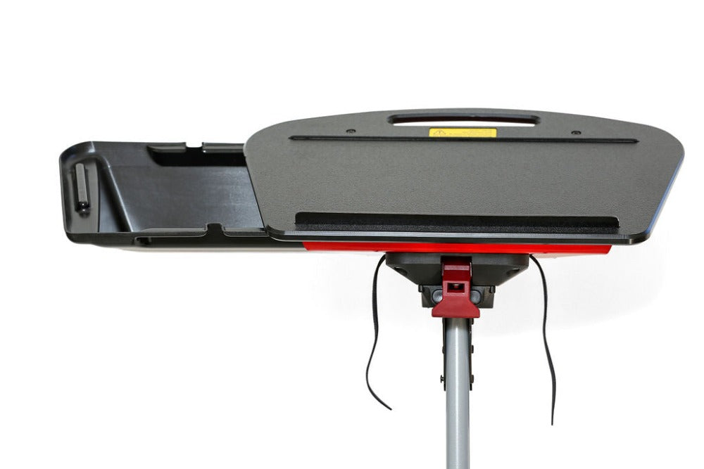 A close-up view of the top part of a TurboDesk lean stool showcasing a textured black shelf with a red underside, a handle, and a slot for tools. The stool is mounted on a silver adjustable pole with a red locking mechanism, set against a white background.